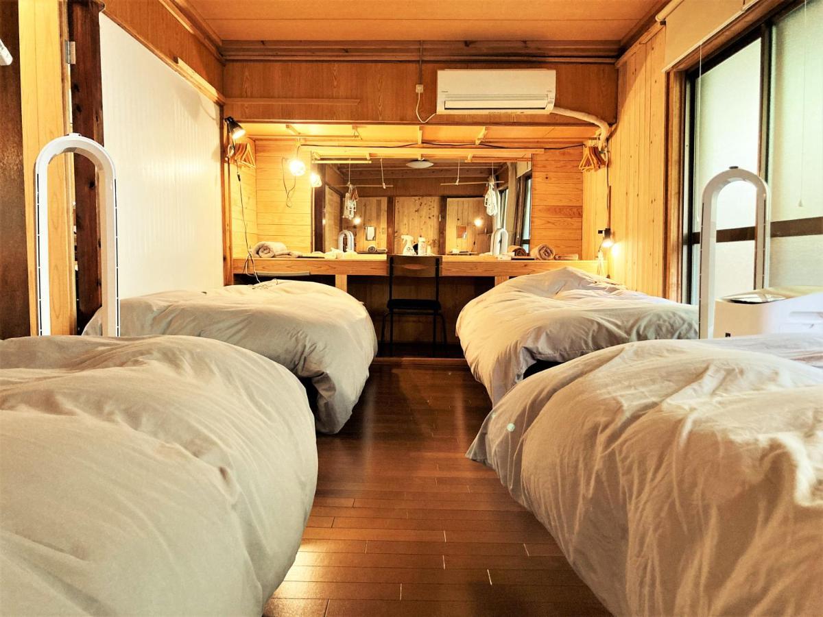 奄美ゲストハウス Hub A Nice Inn Setouchi  외부 사진